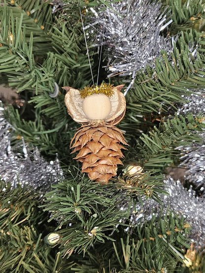 Gold handmade China Fir Tree Cone Angel Christmas Ornament on a Christmas Tree