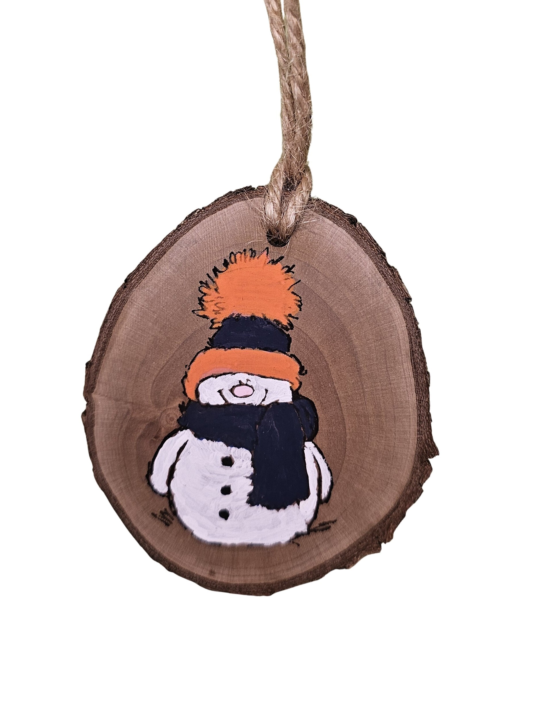 2-3 inch Wood slice Christmas ornament with a snowman hand painted in navy and orange.