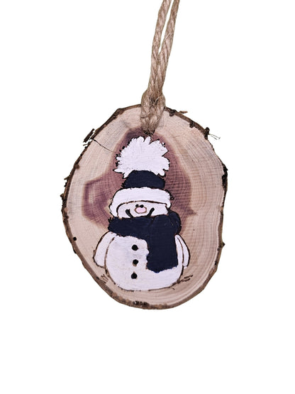 2-3 inch Wood slice Christmas ornament with a snowman hand painted in white and navy.