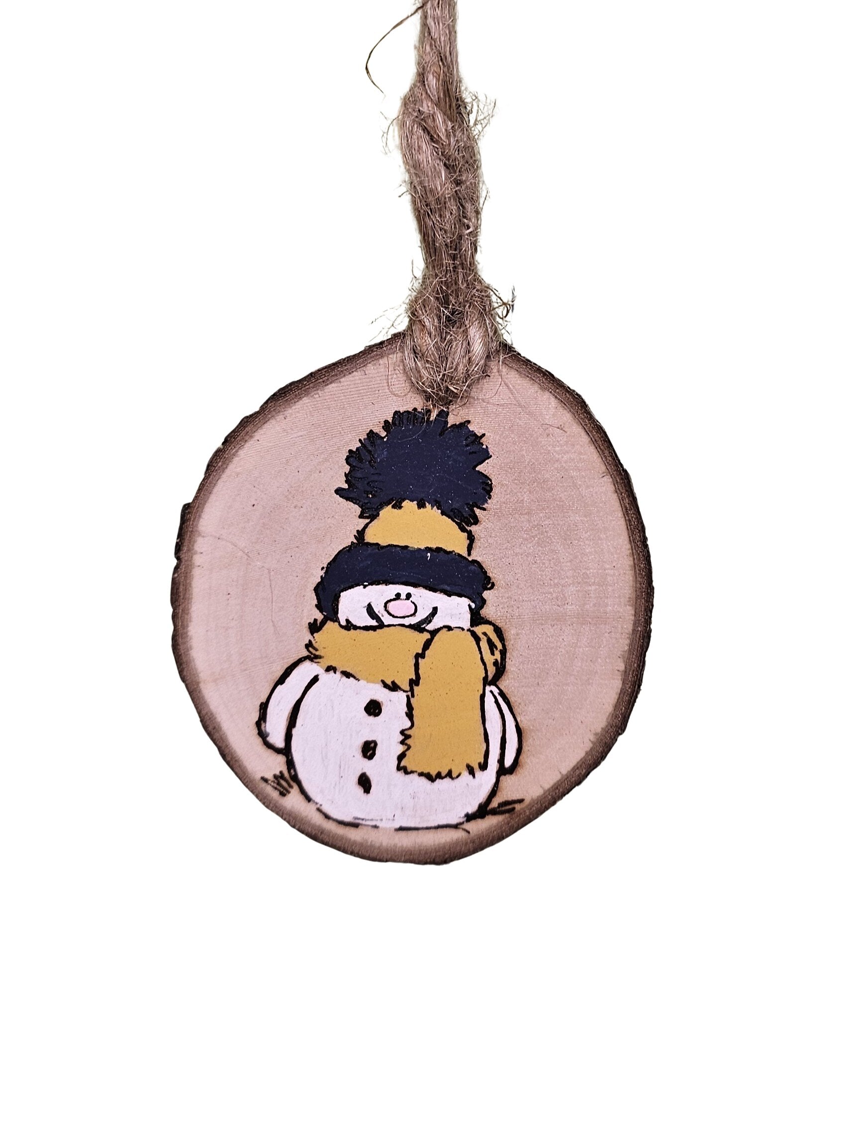 2-3 inch Wood slice Christmas ornament with a snowman hand painted in yellow and navy.