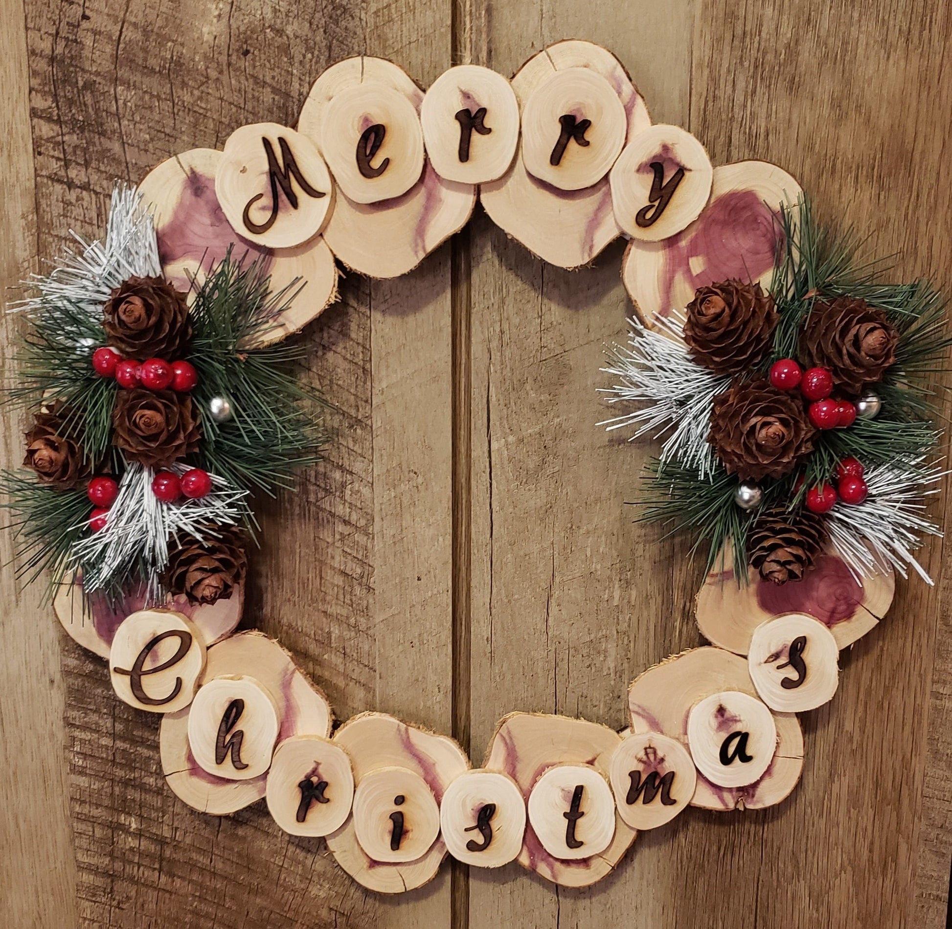 Natures Christmas - foraged cedar wood door wreath decoration stating Merry Christmas